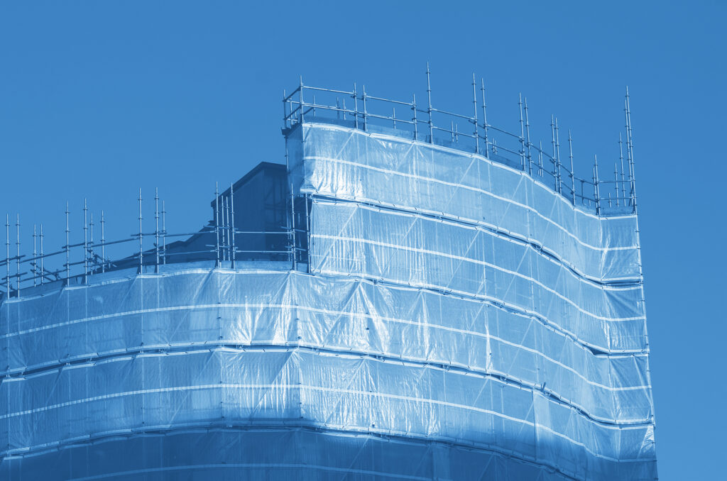 wrapped building, scaffolding Manchester UK England